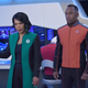 Claire and Orville engineering chief John LaMarr (J. Lee) on the bridge.